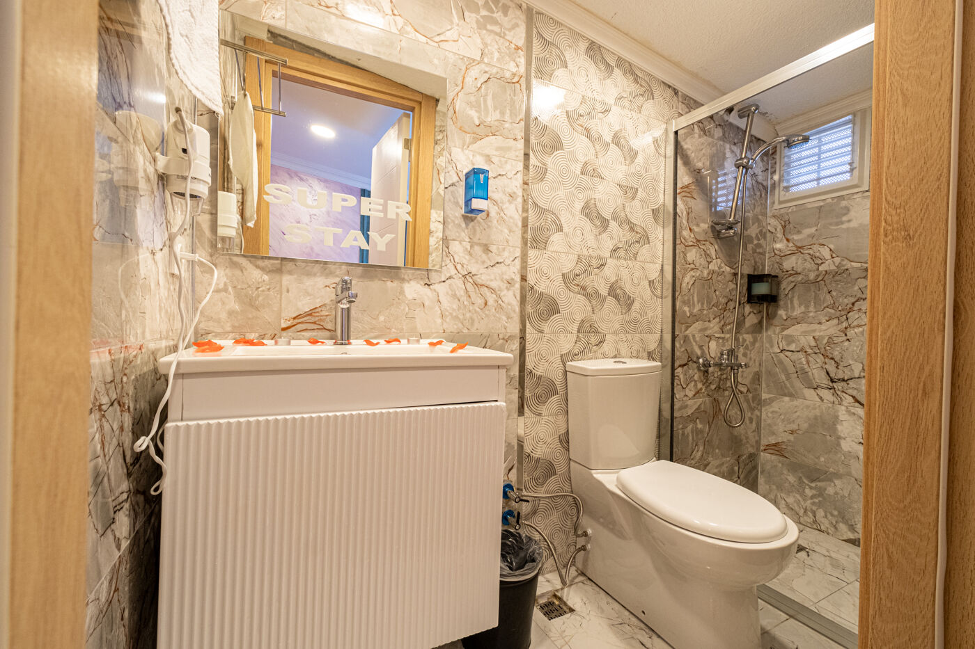 Outdoor swimming pool with sunbeds