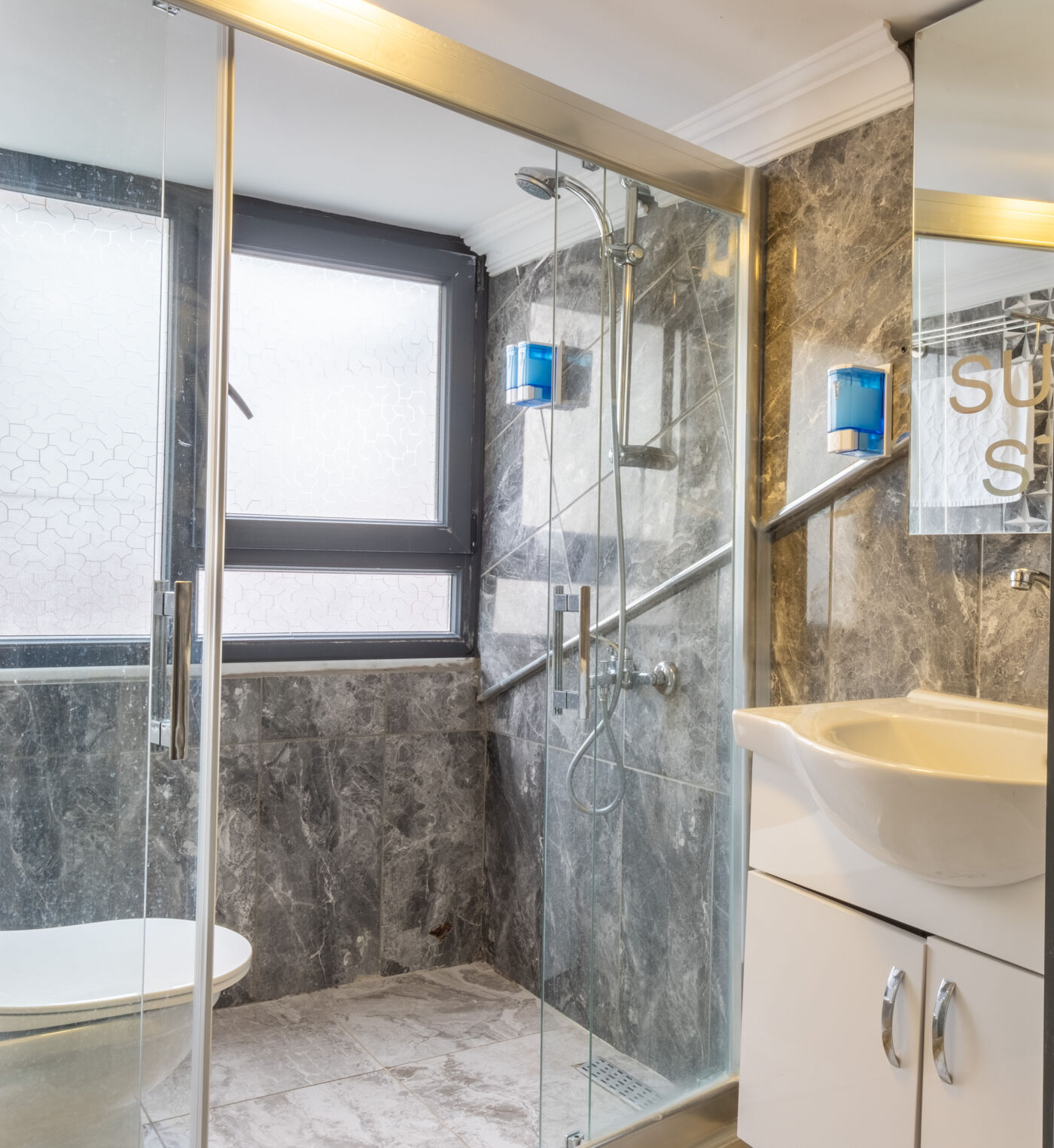 Outdoor swimming pool with sunbeds